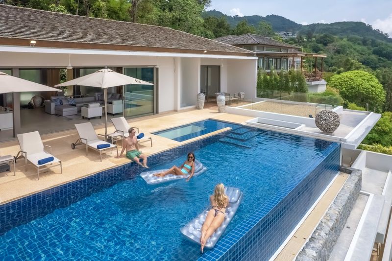 Swimming in the pool with the Living Room near at hand.